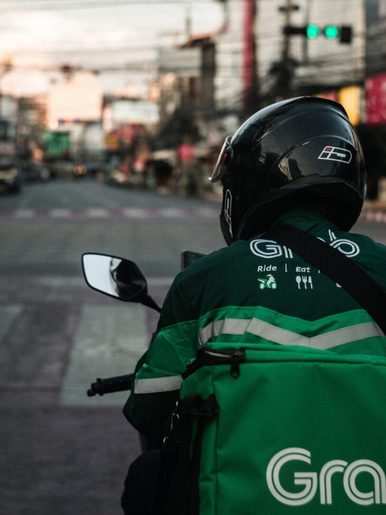 Grab Driver on scooter from behind