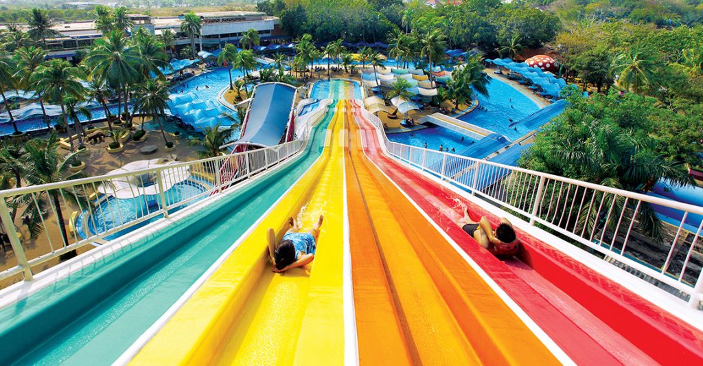 Water slide in rainbow colors, one of the best kids activities in bangkok