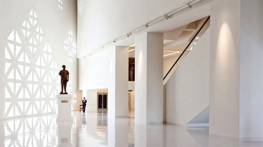 Entrance of MOCA Museum in Bangkok with white walls and high ceilings