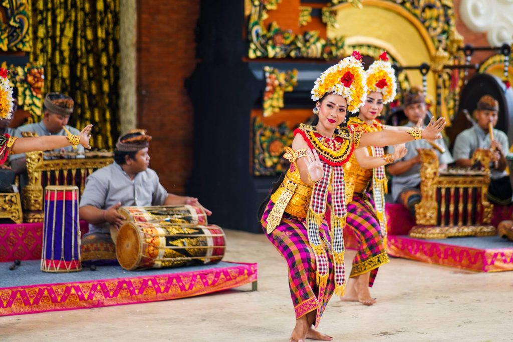 Balinese Traditional dancers performing at a temple.