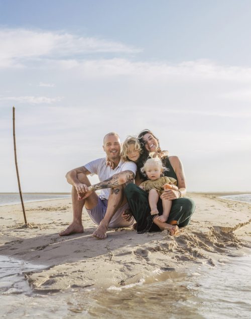 Digital Nomad Family with two kids sitting on the beach, How to become a Digital Nomad Family