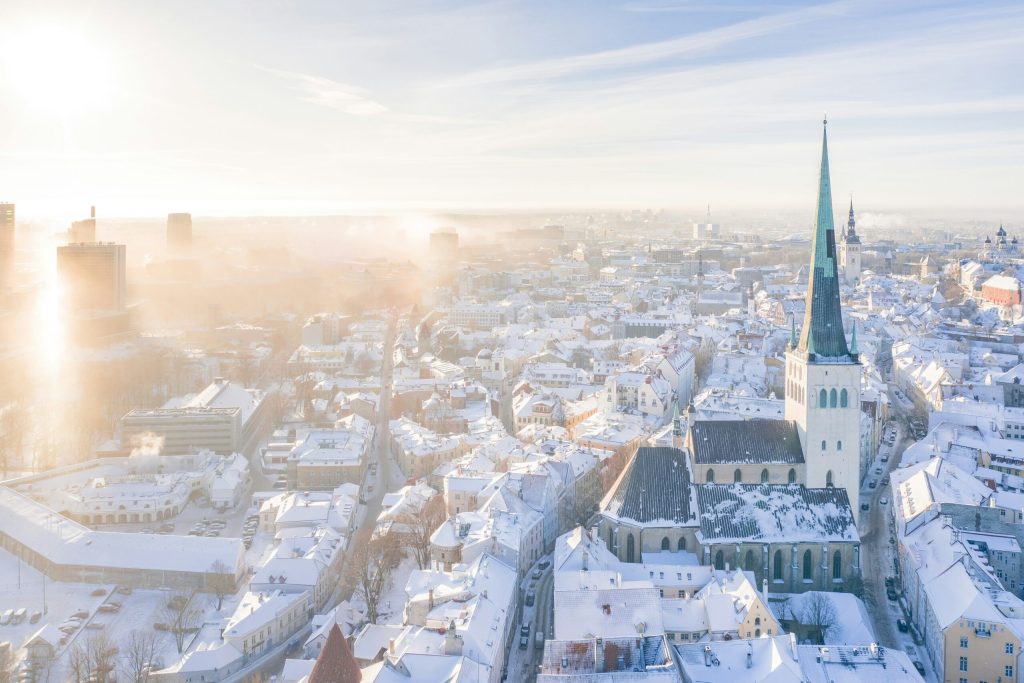 European city covered in snow, Digital Nomad friendly countries.