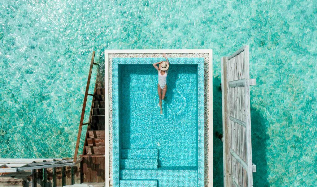 Women in a pool, shot from avove