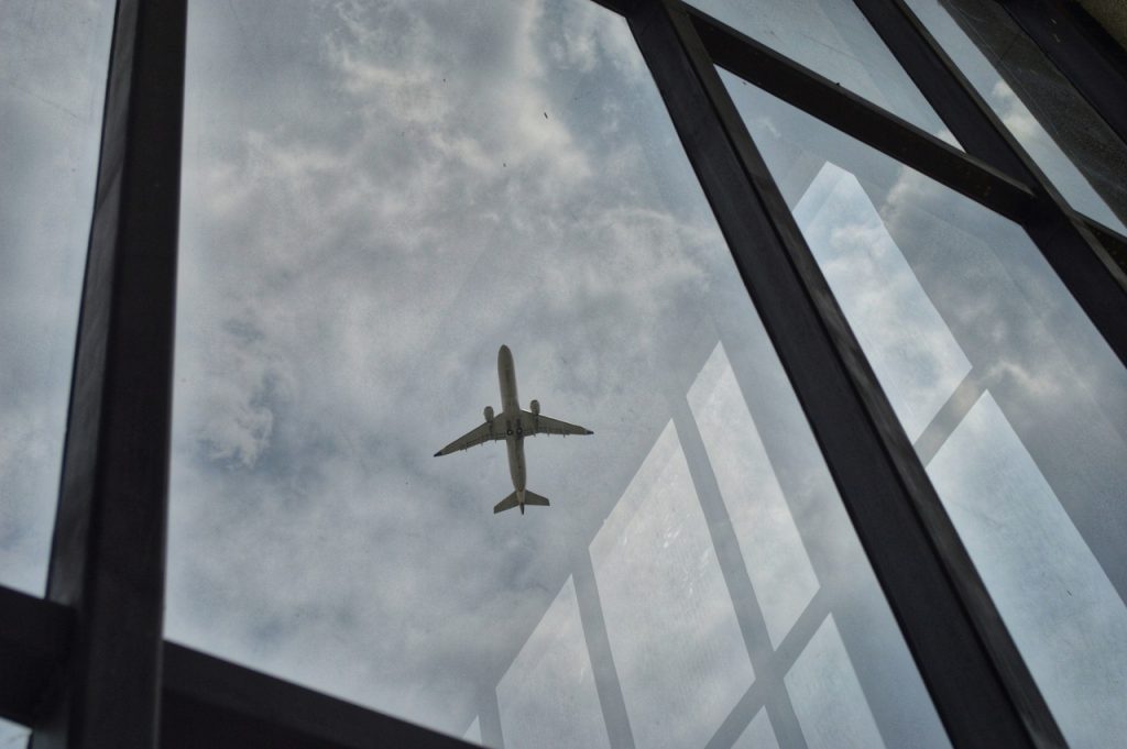 Plane in the sky, seen from below