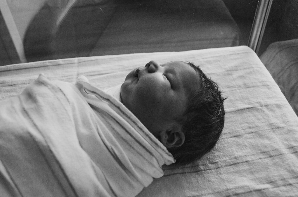 black-white photo of a Baby born in Thailand