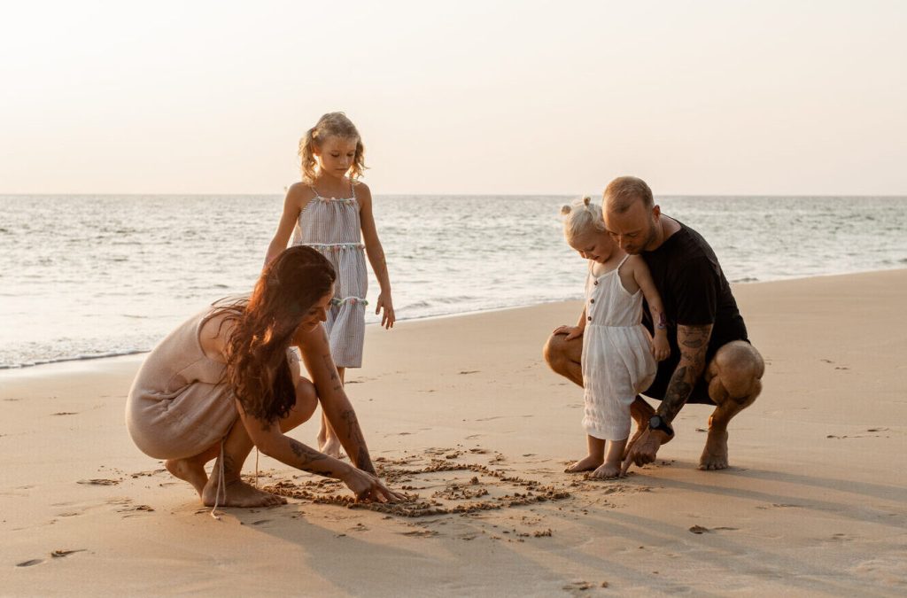 Digital Nomad Family playing on the beach