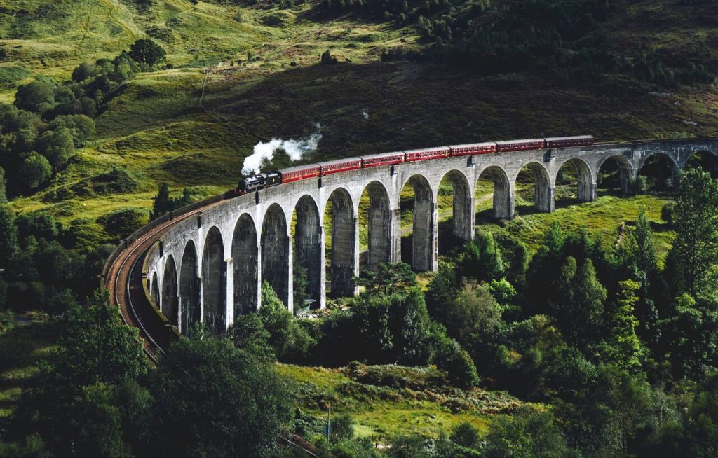 Old train on a big stone bridge, Taxes Digital Nomad