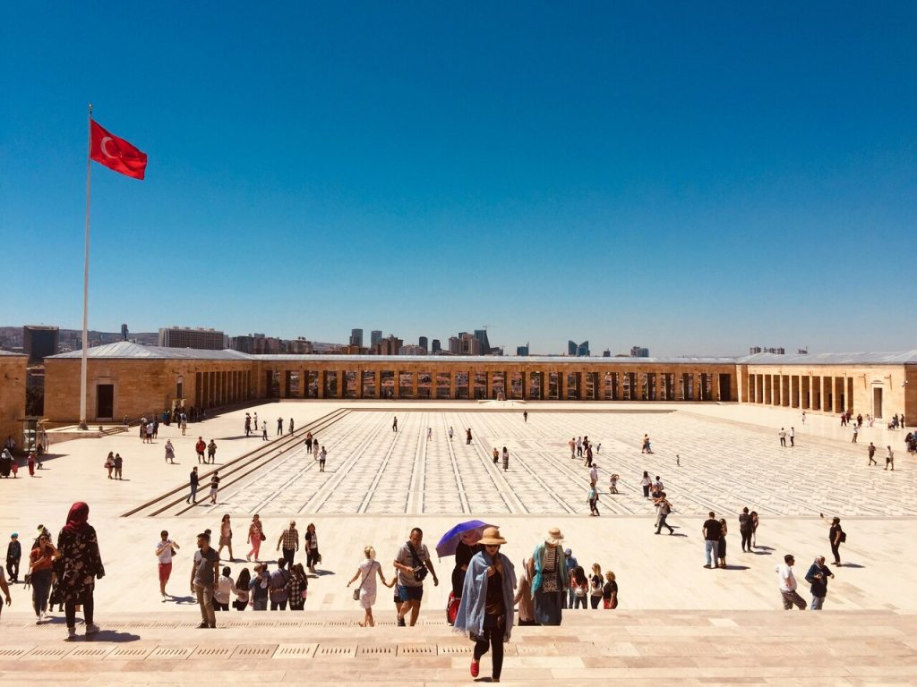 huge place in front of mausoleum with people