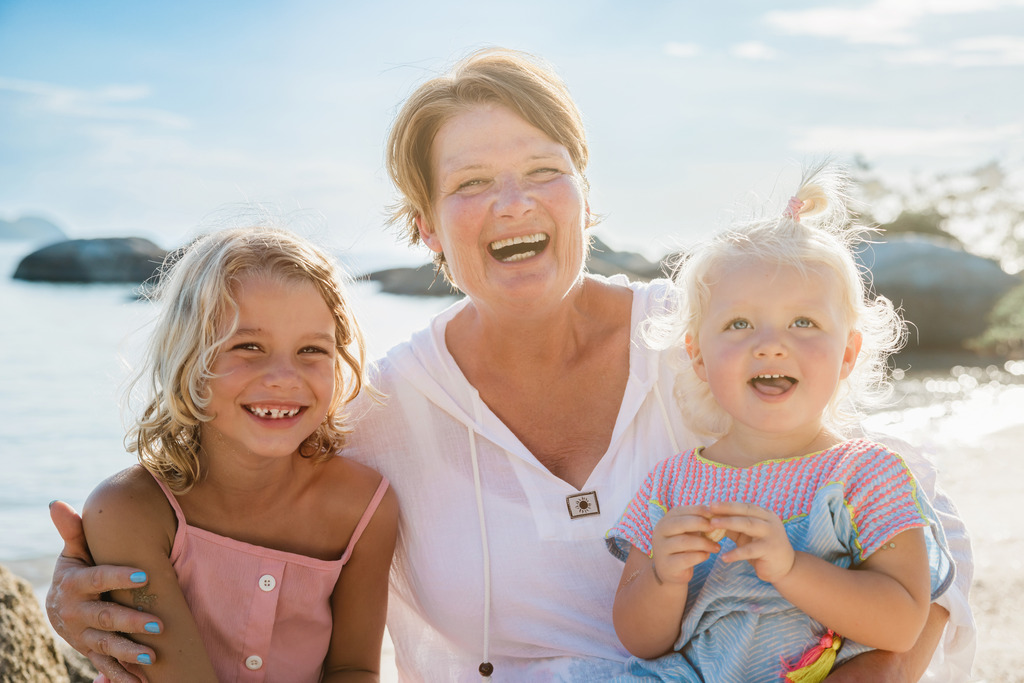 Grandmother with two toddler grandchildren