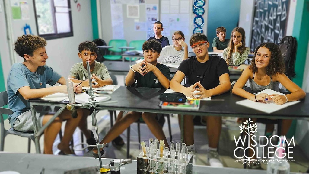 Students sitting on a table in a classroom, Koh Phangan International Schools