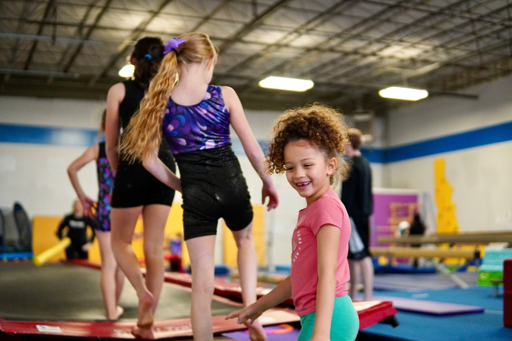 Girls doing gymnastics, unschooling and deschooling