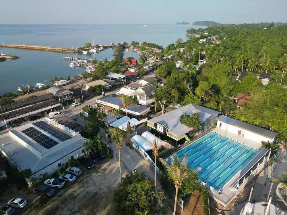 Koh Phangan International Schools – Full List 2026 4 Aerial view of the International School of Pha Ngan campus in Ban Tai, Koh Phangan
