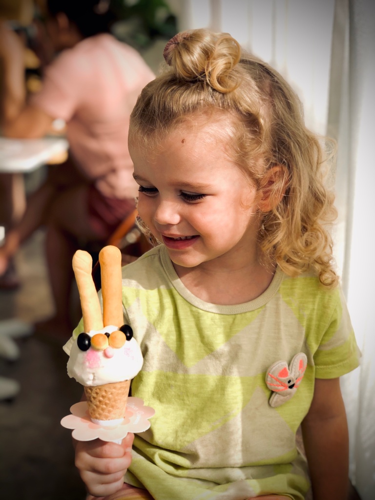 Little girl holding an ice cream