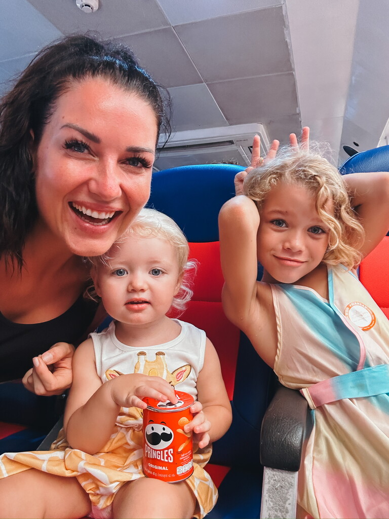 Mum with two young girls traveling, travel with toddler checklist