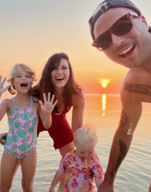 Family of four at the beach