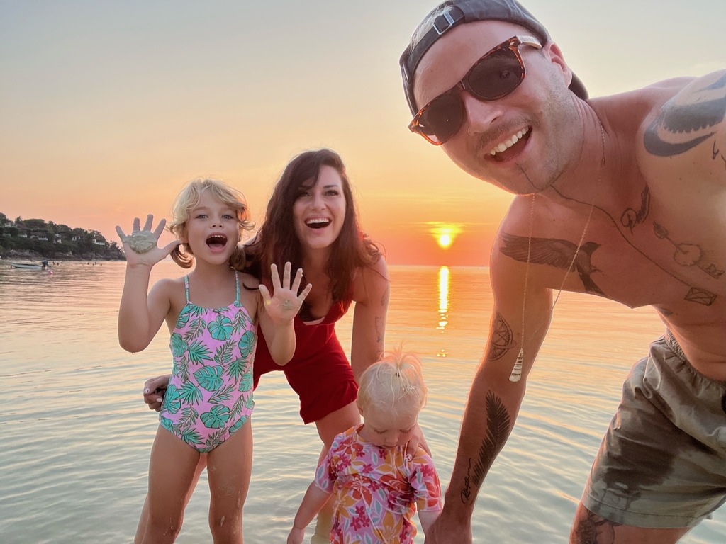 Family of four at the beach