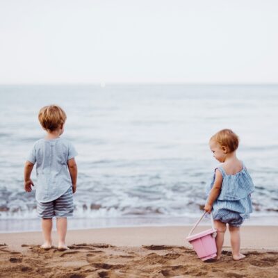 Two toddlers at the beach