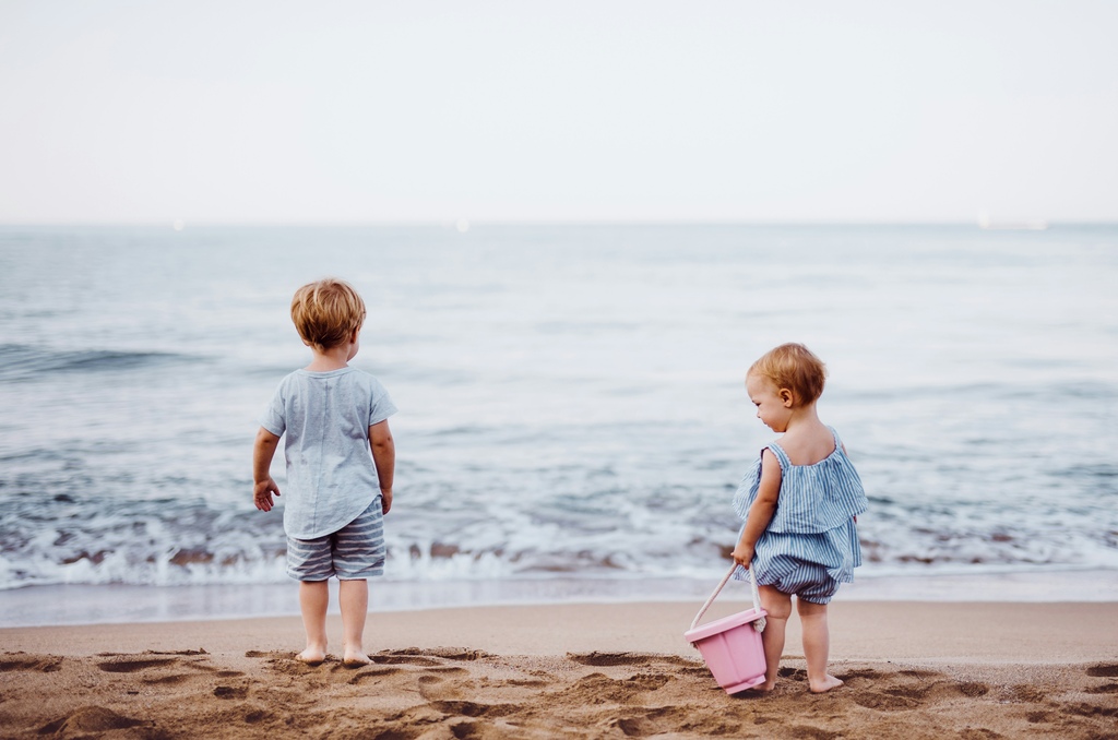 Two toddlers at the beach