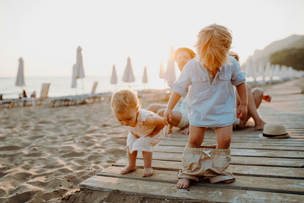 Two toddlers on the beach