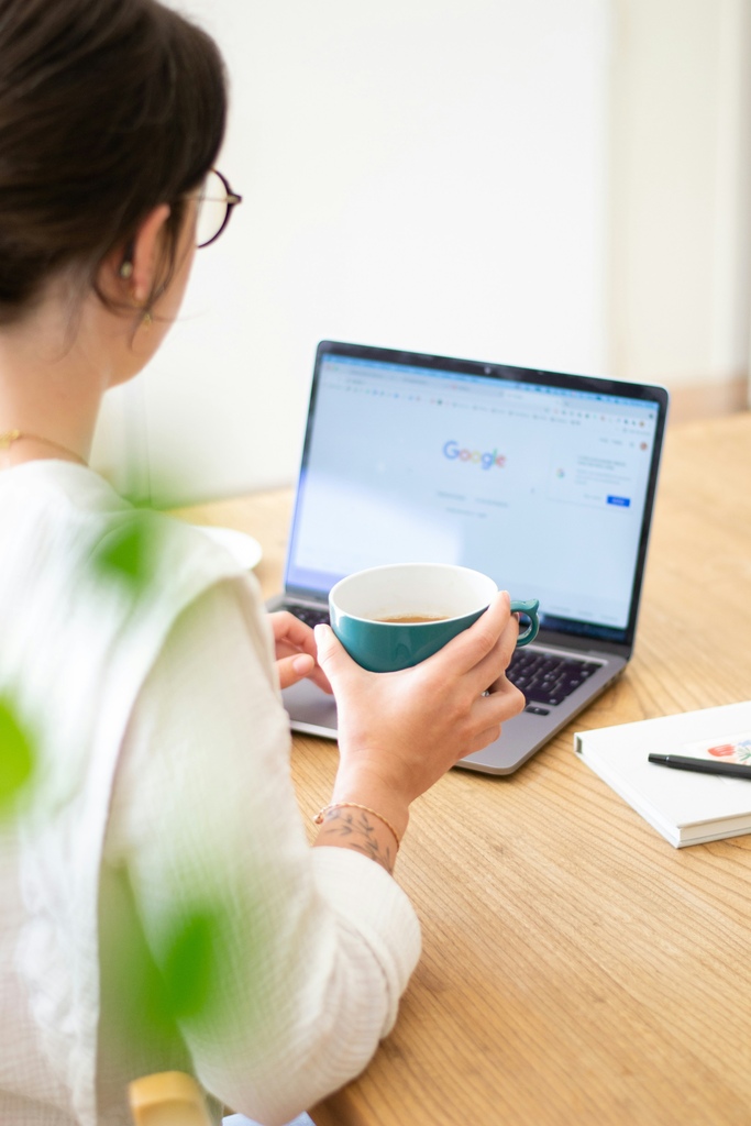 Woman working on laptop, nomading