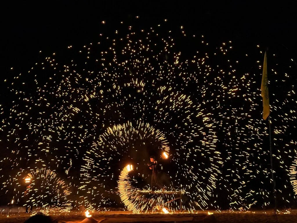 Koh Phangan for Seniors: Best Things to Do for Visitors 60+ 13 Fire Show at night on a beach.