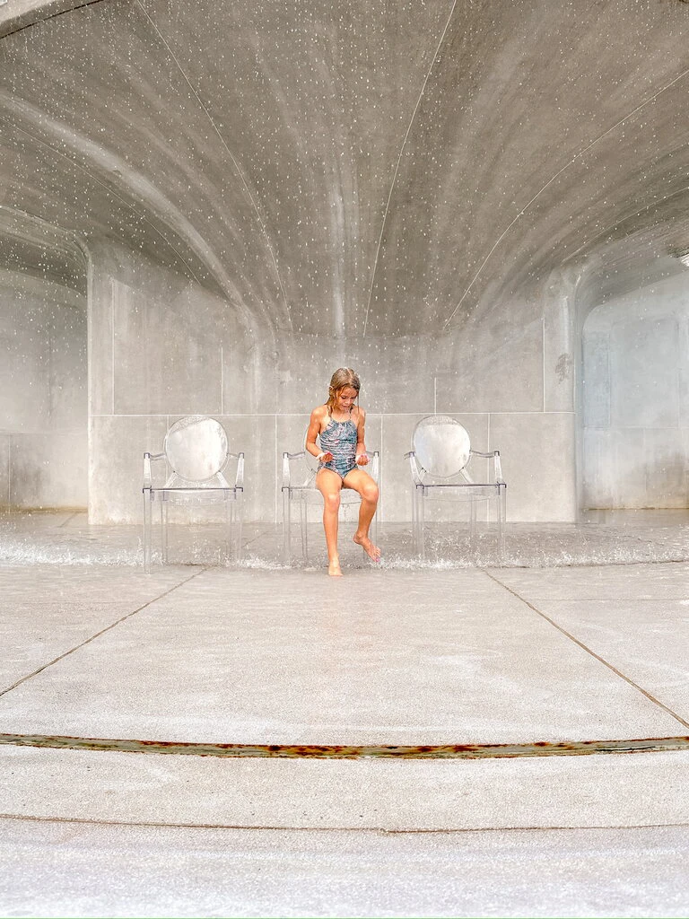 Little girl playing in the water