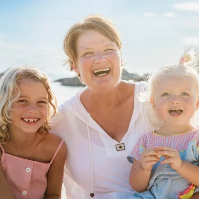 Grandma with her grandchildren on the beach, Koh Phangan for Seniors