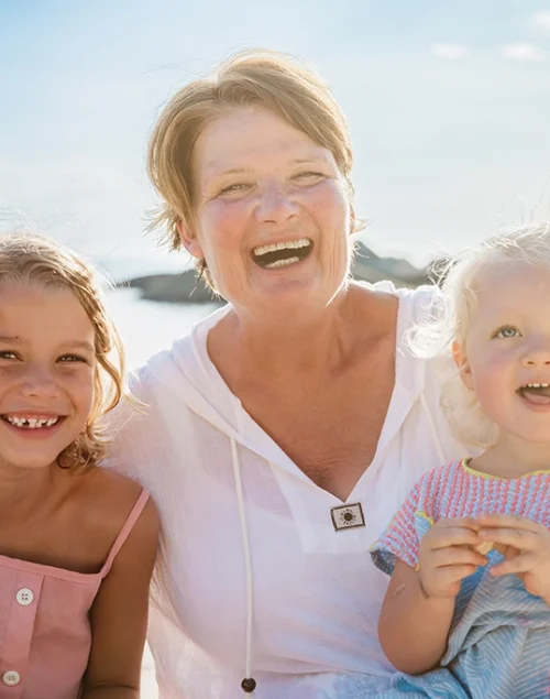 Grandma with her grandchildren on the beach, Koh Phangan for Seniors