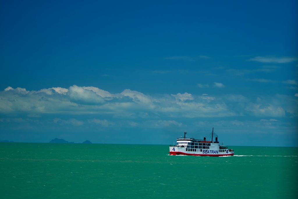 White and red colored ferry in Thailand