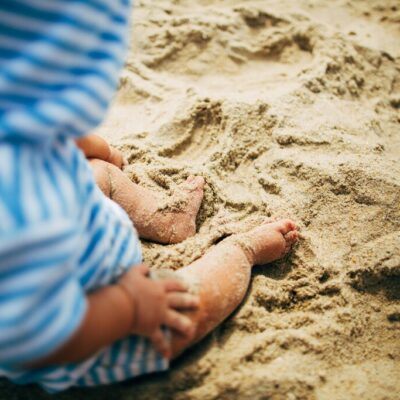 Baby feet on sand