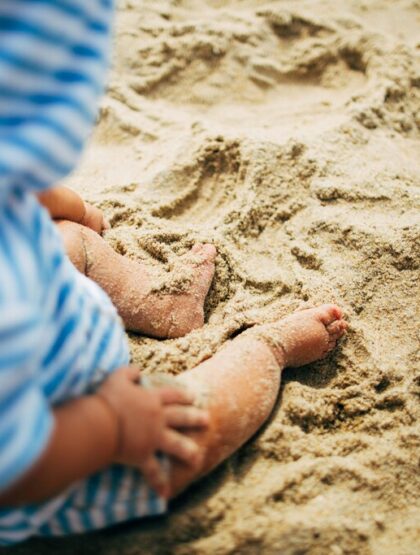 Baby feet on sand