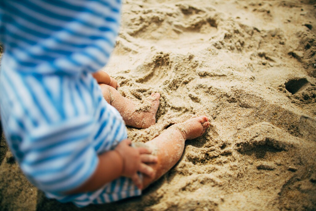 Baby feet on sand