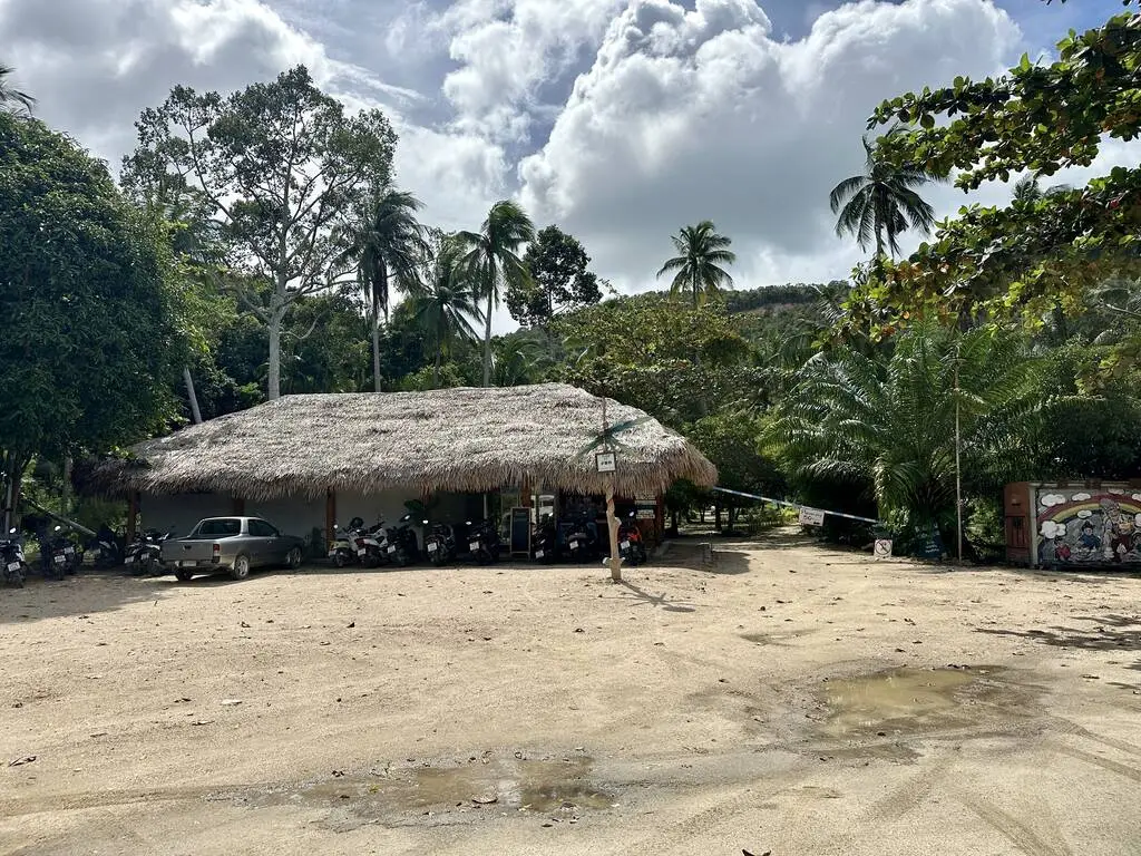 Sandy parking lot with bamboo house, Wang Sai Waterfall in Koh Phangan