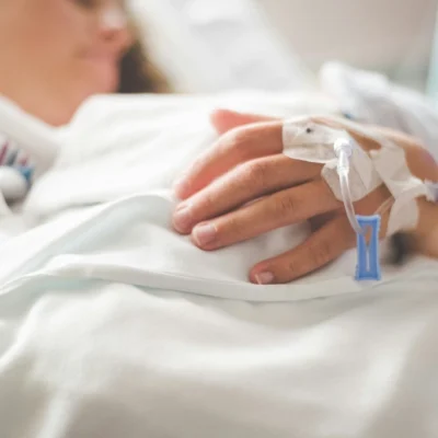 Woman in hospital bed