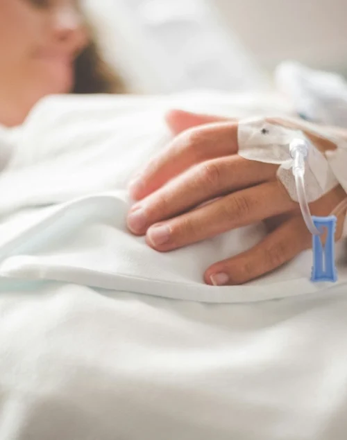 Woman in hospital bed