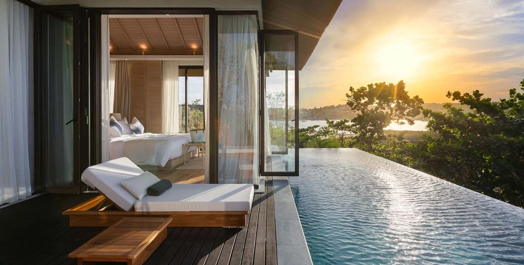 Modern Hotel room with infinity pool and sea view