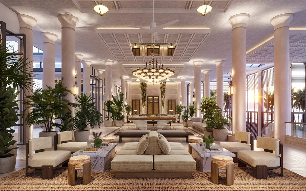 Hotel lobby with high ceilings and beige interior