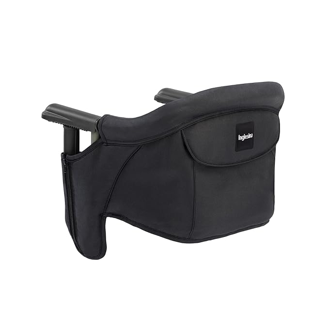 A black portable high chair.