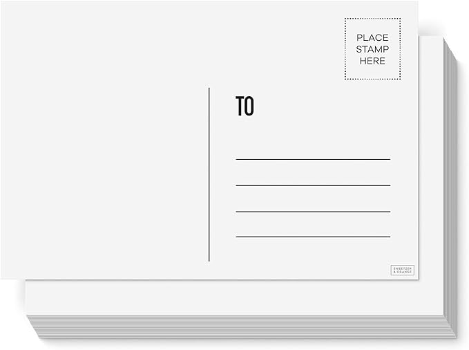 A staple of white, blank postcards.