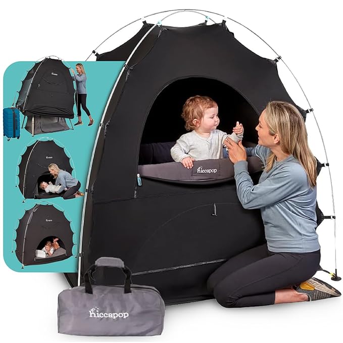 A woman and a child in a tent.