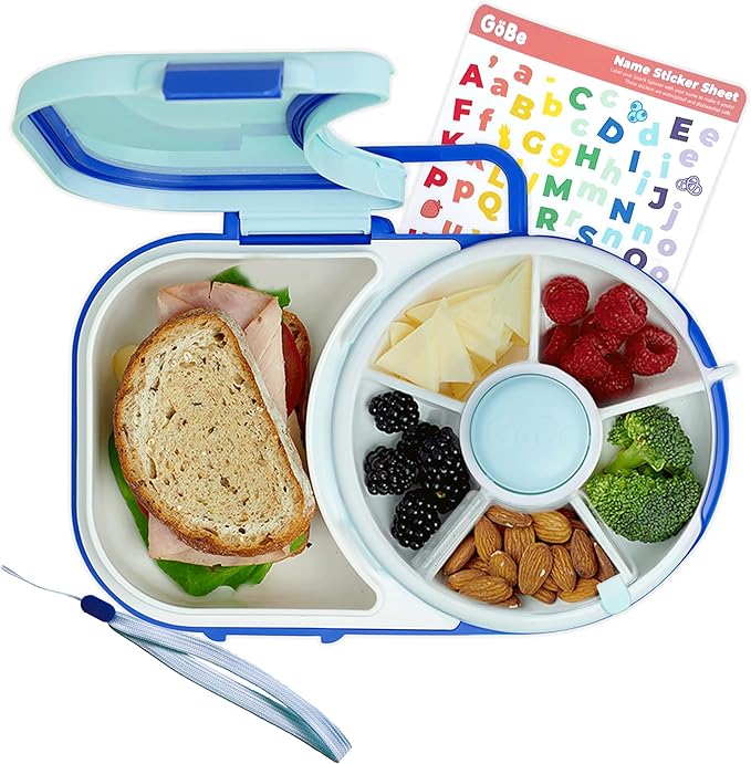 A lunch box with a sandwich and fruits.