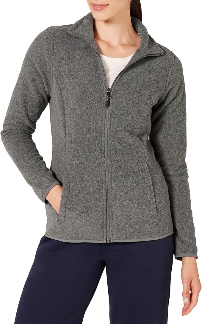 Woman wearing a grey sweater.