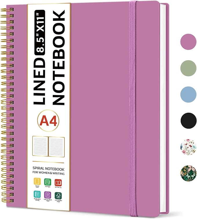 Pink Notebook with golden spiral.