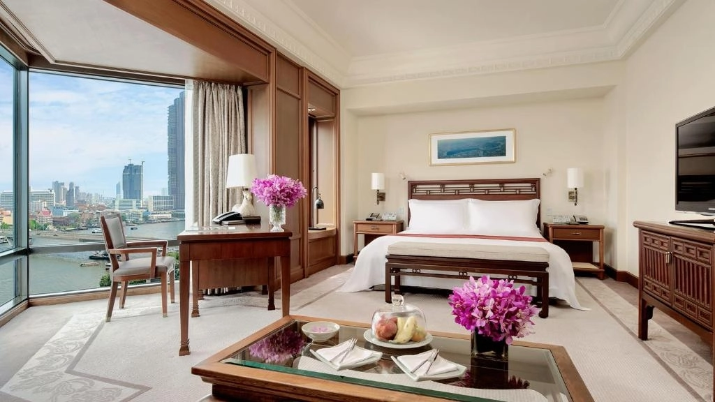 Hotel Room with city view and beige-brown interior