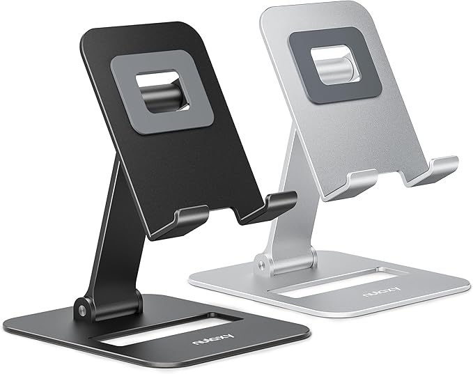 A balck and a silver device stand next to each other.