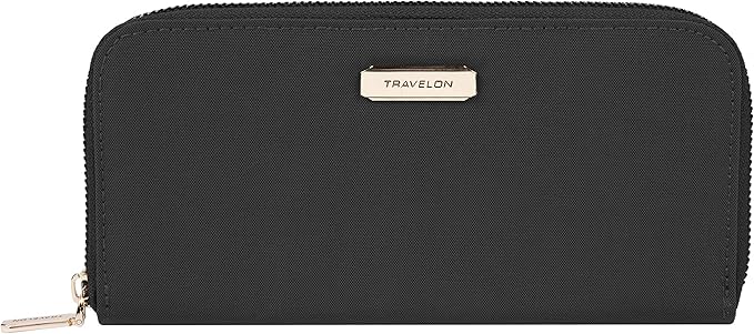 Black travel wallet with a metallic sign.