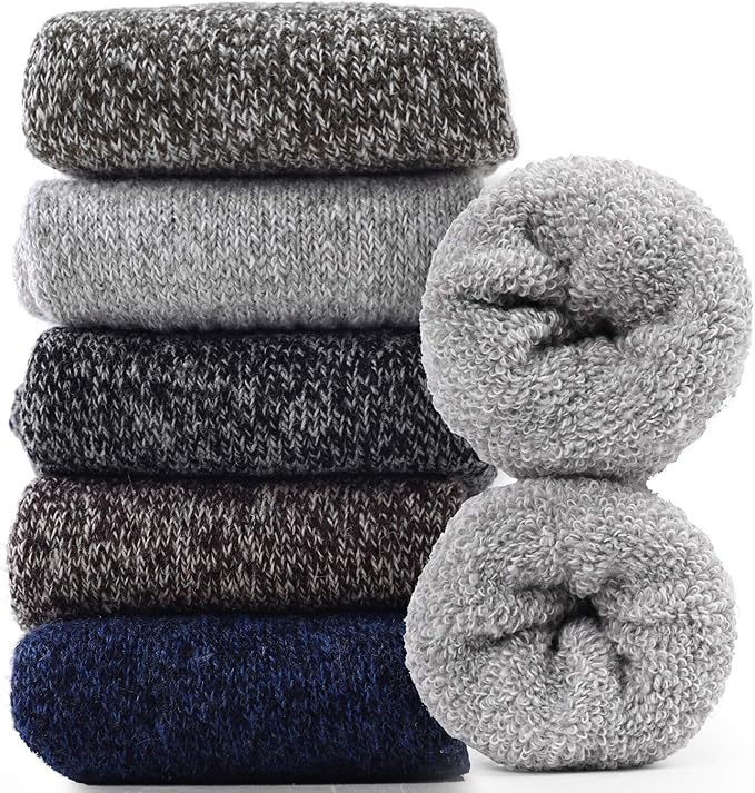 Five pairs of warm socks in grey tones.