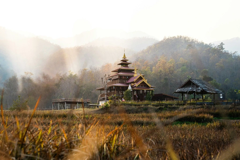 Traditional thai house standing in hilly landscape