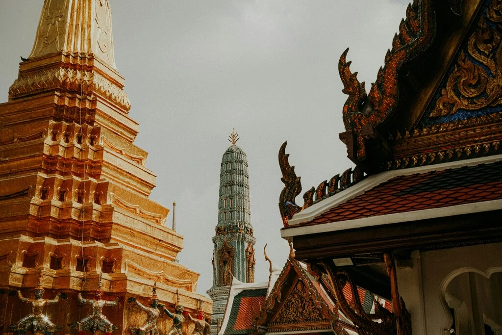 Golden temple tower and traditional buildings in thailand, Best things to do in Thailand