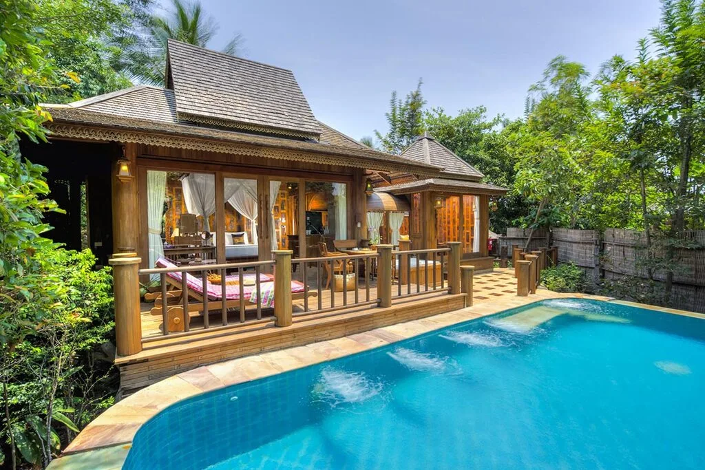 Wooden Private Villa Bungalow with sunbeds and large private pool.